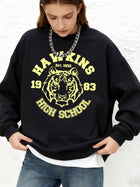 Bluza z okrągłym dekoltem Stranger Things Hawkins High School tygrys