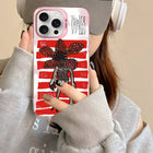 Etui iPhone matowe Stranger Things Demogorgon w paski
